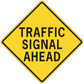 Yellow diamond road sign sticker: TRAFFIC SIGNAL AHEAD, black border text