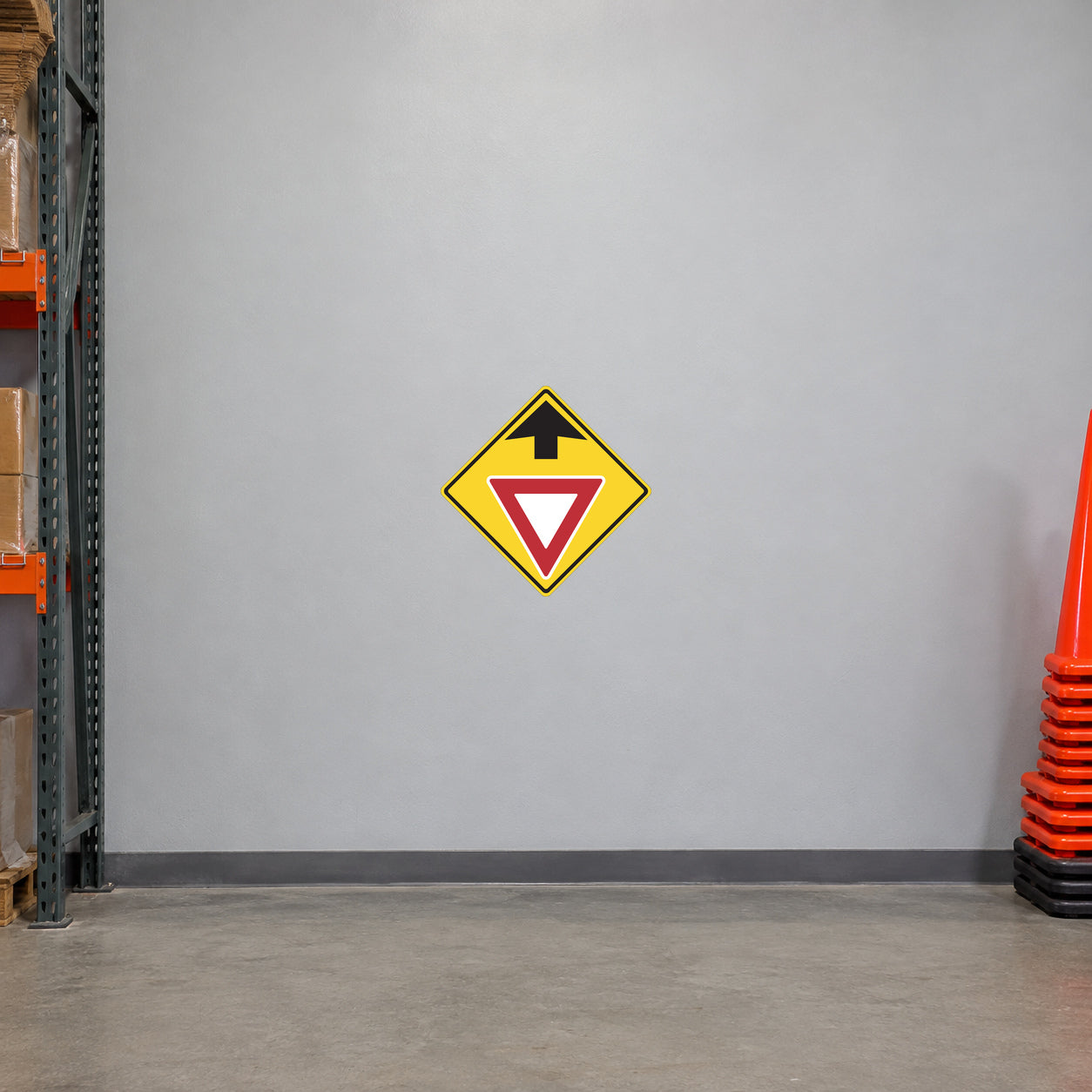 Road sign sticker: yellow diamond with red down arrow
