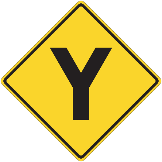 Yellow road sign sticker with black downward arrow in diamond