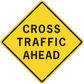 Yellow road sign sticker with black border text "CROSS TRAFFIC AHEAD"