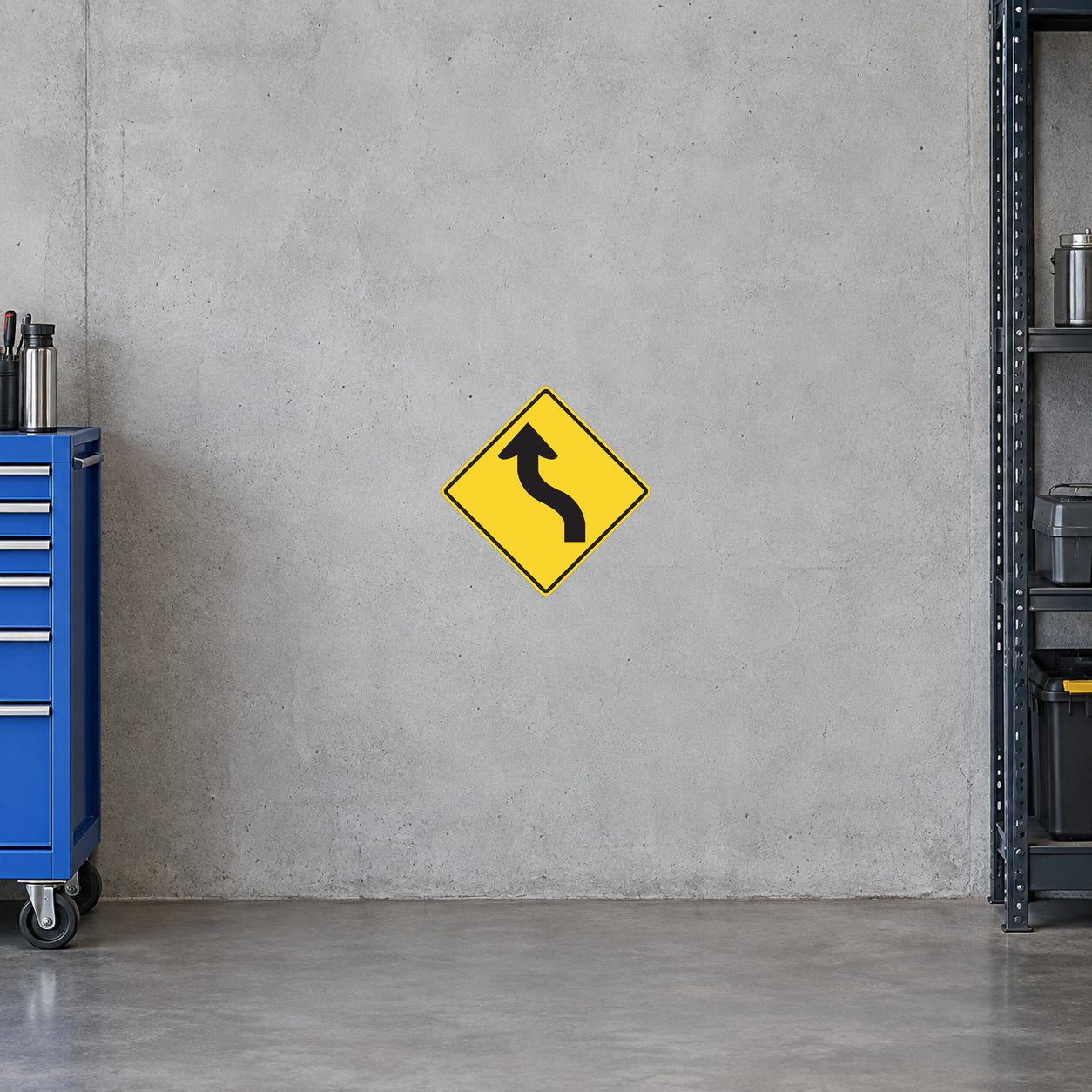 Yellow road sign sticker with black curved arrow in a diamond shape.