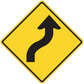 Yellow road sign sticker with black upward arrow in a diamond