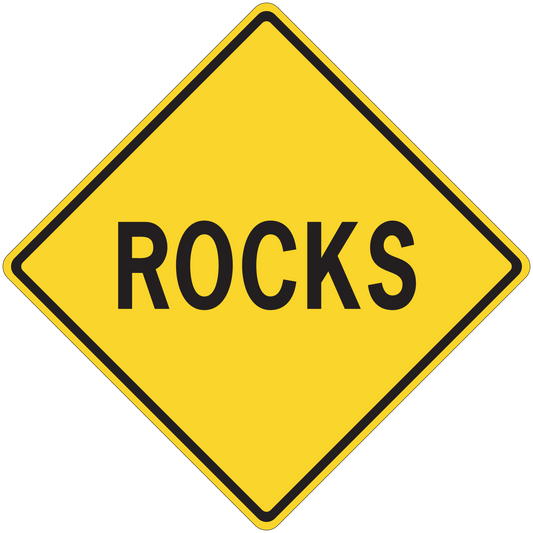 Yellow road sign sticker, diamond shape with black border and ROCKS text