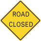 Road sign sticker, yellow diamond with black border reading ROAD CLOSED