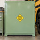 Road Sign Sticker applied in A school transportation office service room, smooth light green cabinet front, bus wheel far right