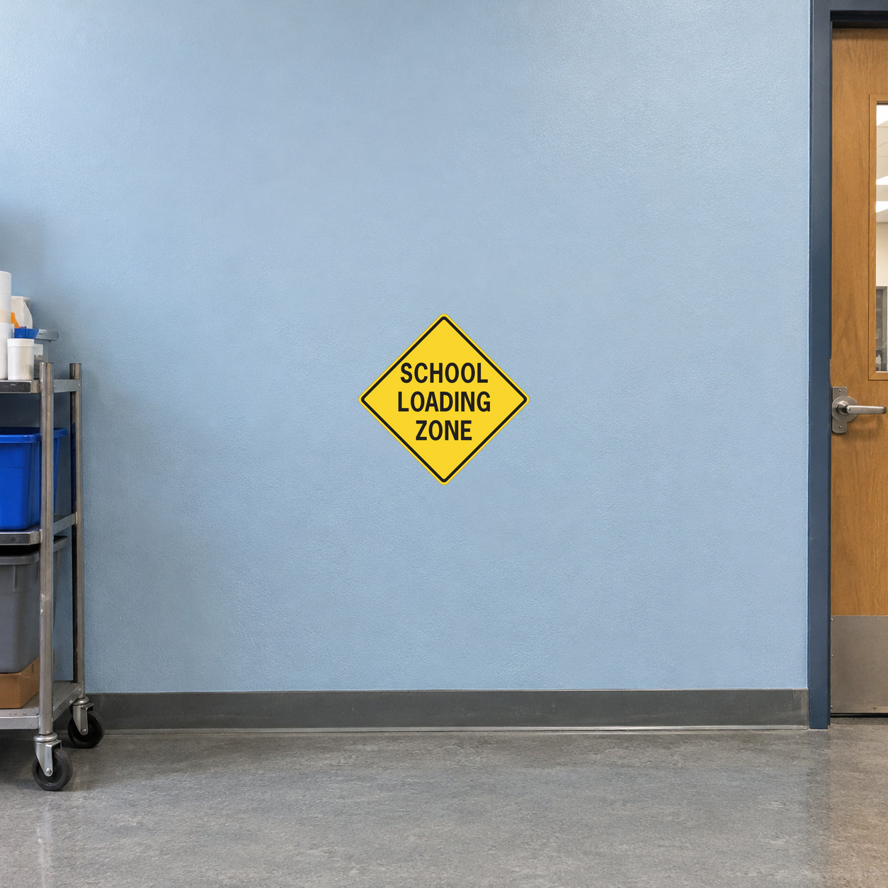 Yellow diamond road sign sticker: 'SCHOOL LOADING ZONE'