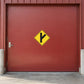 Yellow diamond road sign sticker with black downward arrow