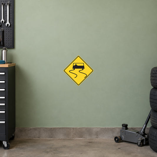 Road sign sticker: yellow diamond with black roadwork truck symbol