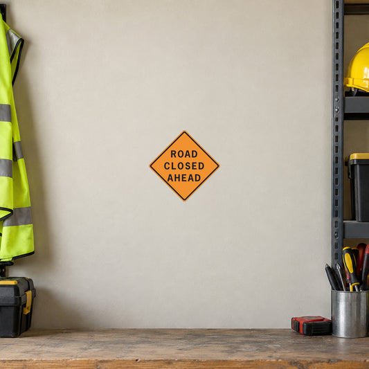 Road closed ahead road sign sticker, orange diamond with black text