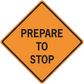 Orange road sign sticker: black-bordered diamond reading 'PREPARE TO STOP'.