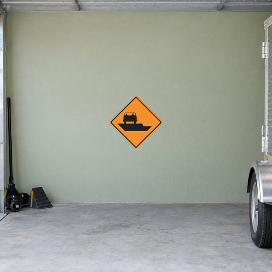 Orange diamond road sign sticker with black truck silhouette