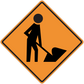 Road sign sticker with orange diamond and black construction worker holding a shovel