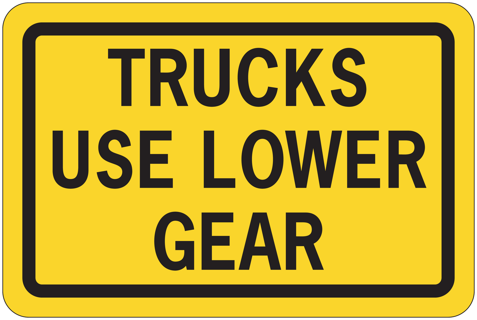 Road sign sticker with yellow background, black border, text "TRUCKS USE LOWER GEAR"