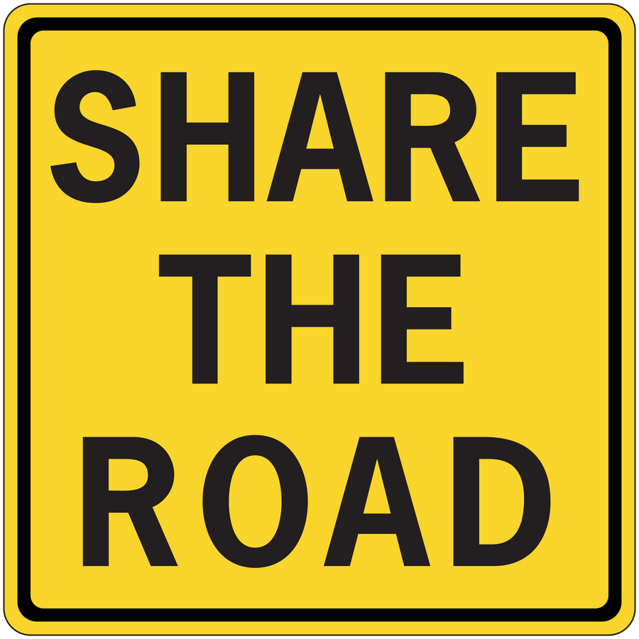 Road sign sticker, yellow square with black border and text 'SHARE THE ROAD'.