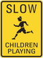 Road sign sticker with yellow background, black border, “SLOW” and “CHILDREN PLAYING” text