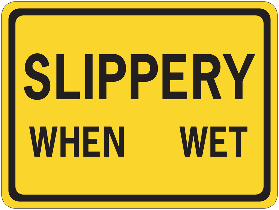 Yellow road sign sticker with black border reading "SLIPPERY WHEN WET".