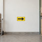 Road Sign Sticker applied in a continuous pale ivory warehouse dispatch wall, small hand truck at far left edge