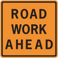 Orange road work ahead sticker with black border and ROAD WORK AHEAD text