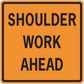 Orange road sign sticker with black text: “SHOULDER WORK AHEAD” on a square black-bordered sign