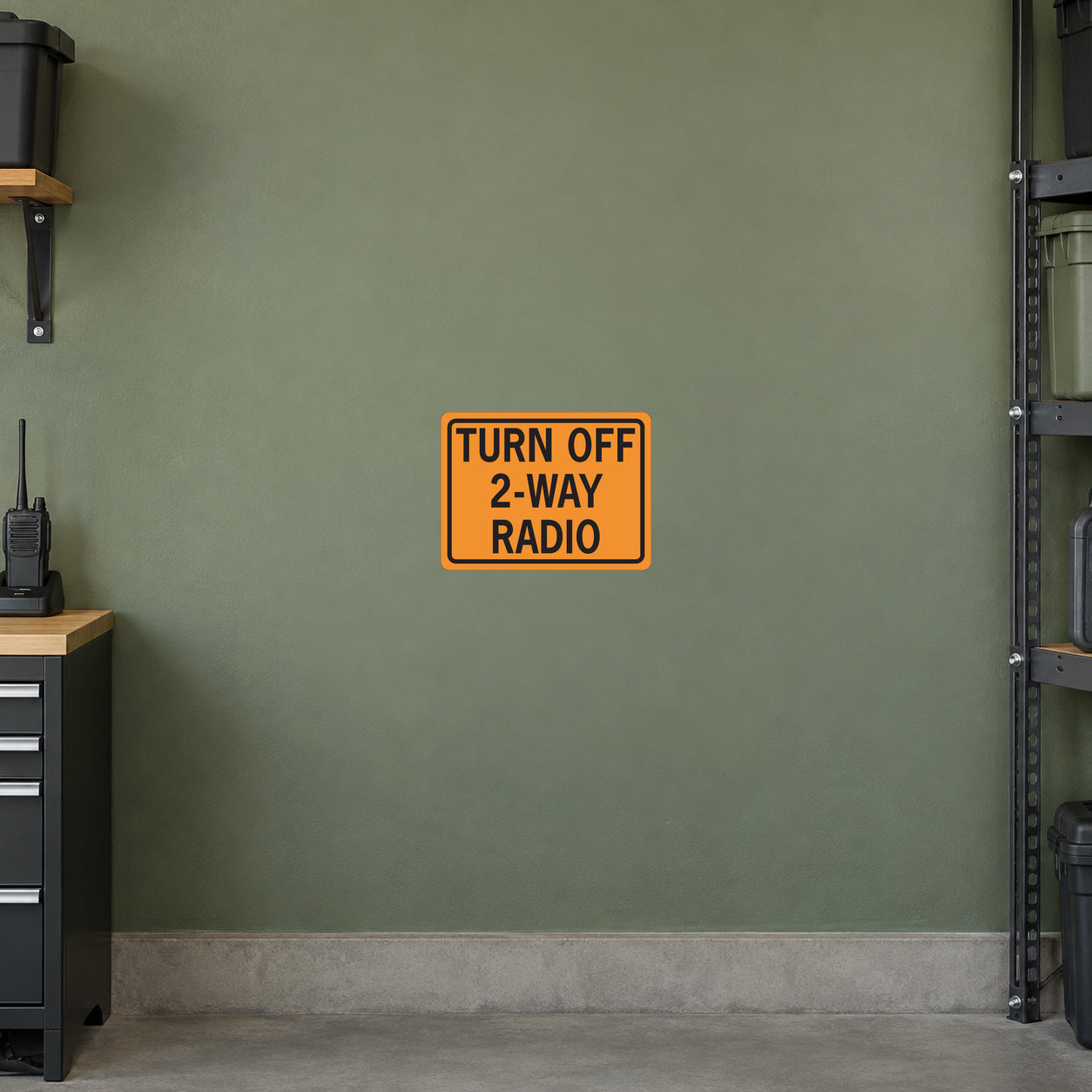 Road sign sticker with orange border: “TURN OFF 2-WAY RADIO”