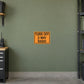 Road sign sticker with orange border: “TURN OFF 2-WAY RADIO”