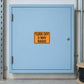 Orange road sign sticker with text: “TURN OFF 2-WAY RADIO”