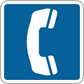 Road sign sticker with white phone-style icon on blue background