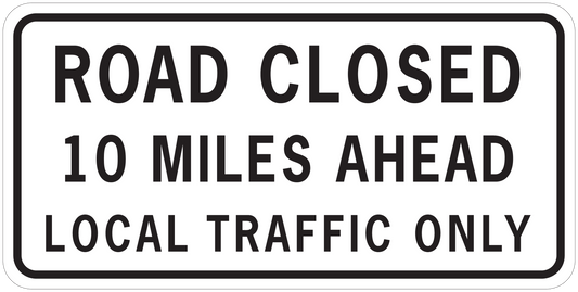 Road sign sticker reading: ROAD CLOSED, 10 MILES AHEAD, LOCAL TRAFFIC ONLY