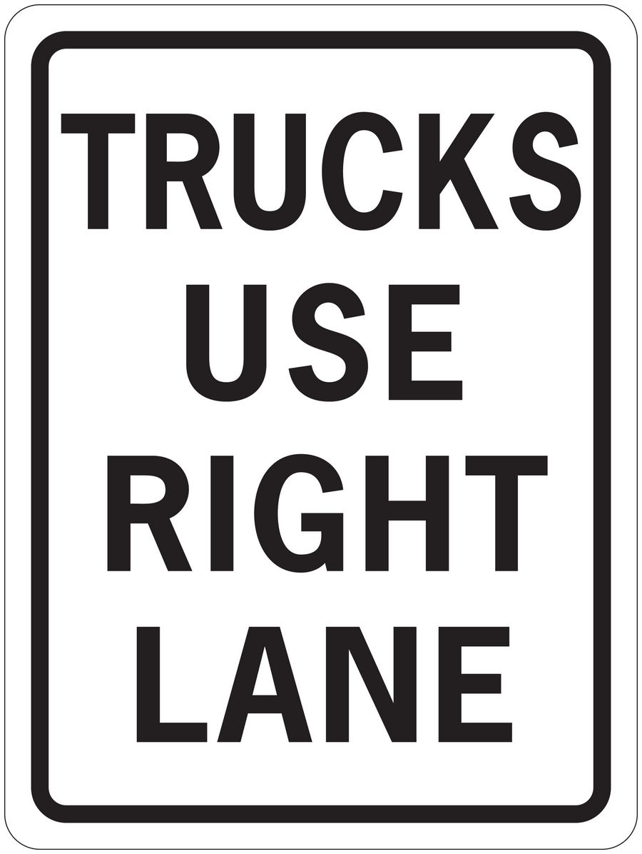 Road sign sticker with bold text: TRUCKS USE RIGHT LANE, black border on white