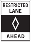 Road sign sticker: RESTRICTED LANE with diamond symbol and AHEAD text
