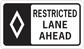 Road sign sticker with black background, white diamond logo and text RESTRICTED LANE AHEAD