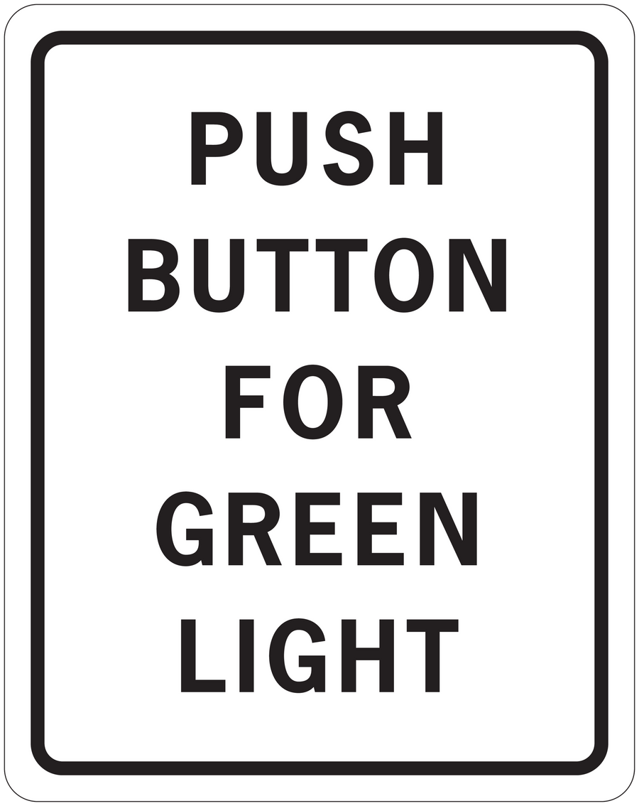 Road sign sticker with black border and text: PUSH BUTTON FOR GREEN LIGHT