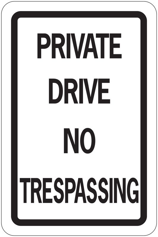 Road sign sticker with “PRIVATE DRIVE NO TRESPASSING” text