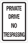 Road sign sticker with “PRIVATE DRIVE NO TRESPASSING” text