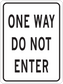 Road sign sticker with black text: “ONE WAY DO NOT ENTER”