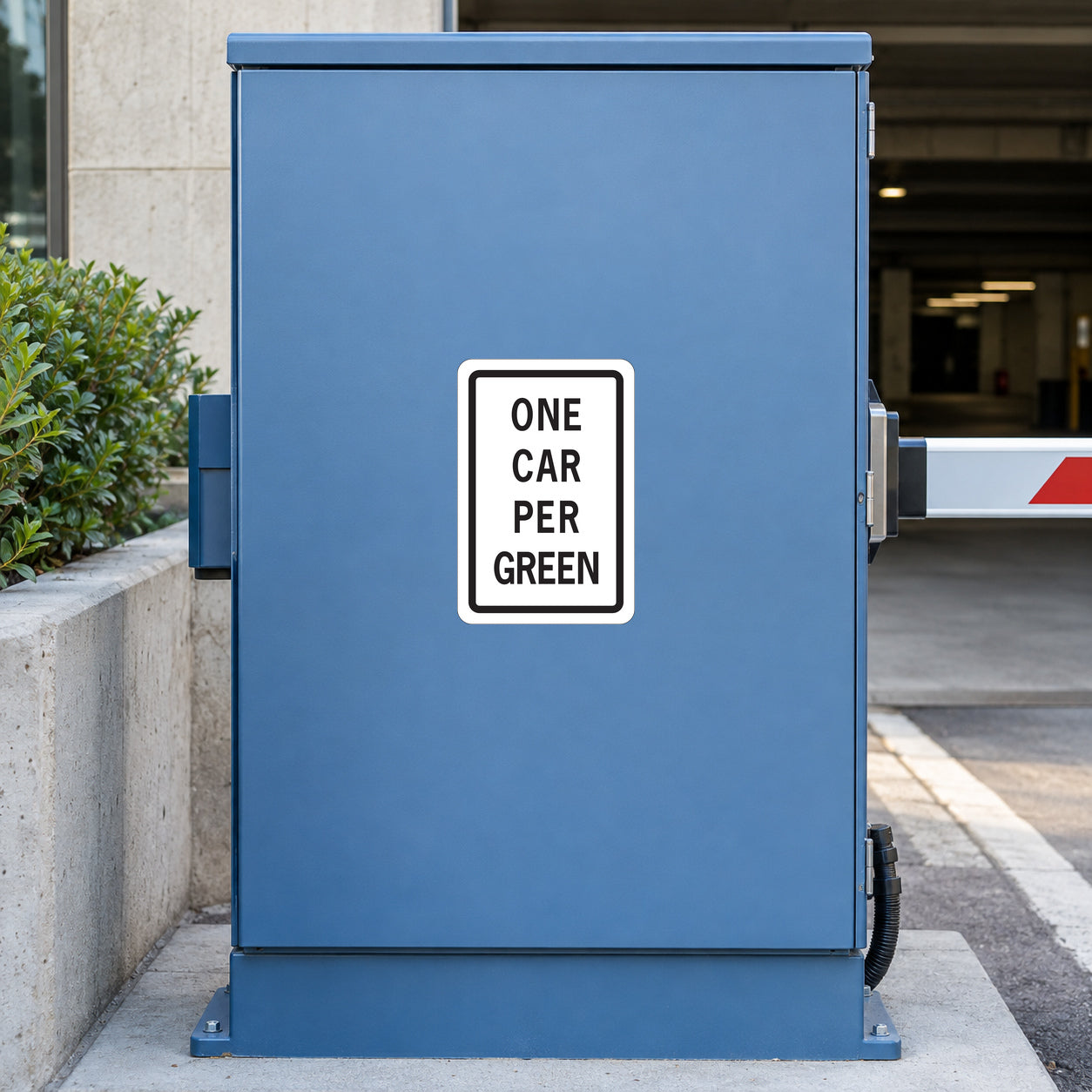 Road sign sticker with white border and text "ONE CAR PER GREEN"
