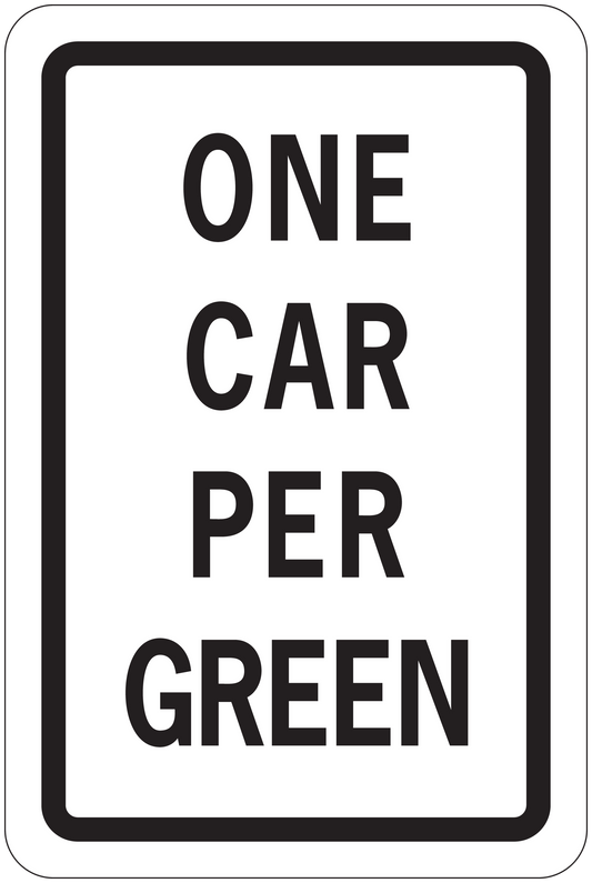 Road sign sticker with 'ONE CAR PER GREEN' text