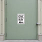 One way road sign sticker with left arrow and bold "ONE WAY" text