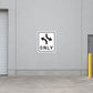 Road Sign Sticker applied in a continuous pale grey distribution yard service wall with bollard far right and flat concrete ground