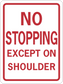 Red-bordered road sign sticker: "NO STOPPING EXCEPT ON SHOULDER"