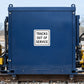 Road Sign Sticker applied in a smooth dark blue single rail maintenance cabinet, track tools at extreme edges