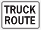 Road sign sticker with bold text “TRUCK ROUTE” in a rectangular frame