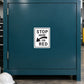 Road Sign Sticker applied to a roadside maintenance facility wall or closed cabinet