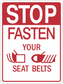 Red road sign sticker with STOP and FASTEN YOUR SEAT BELTS text