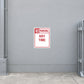 Road sign sticker with red-bordered text reading "NO PARKING ANY TIME"