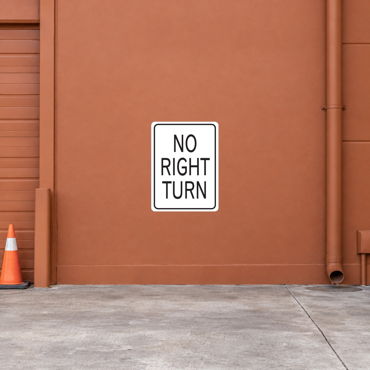 Road sign sticker with "NO RIGHT TURN" text in black on white square
