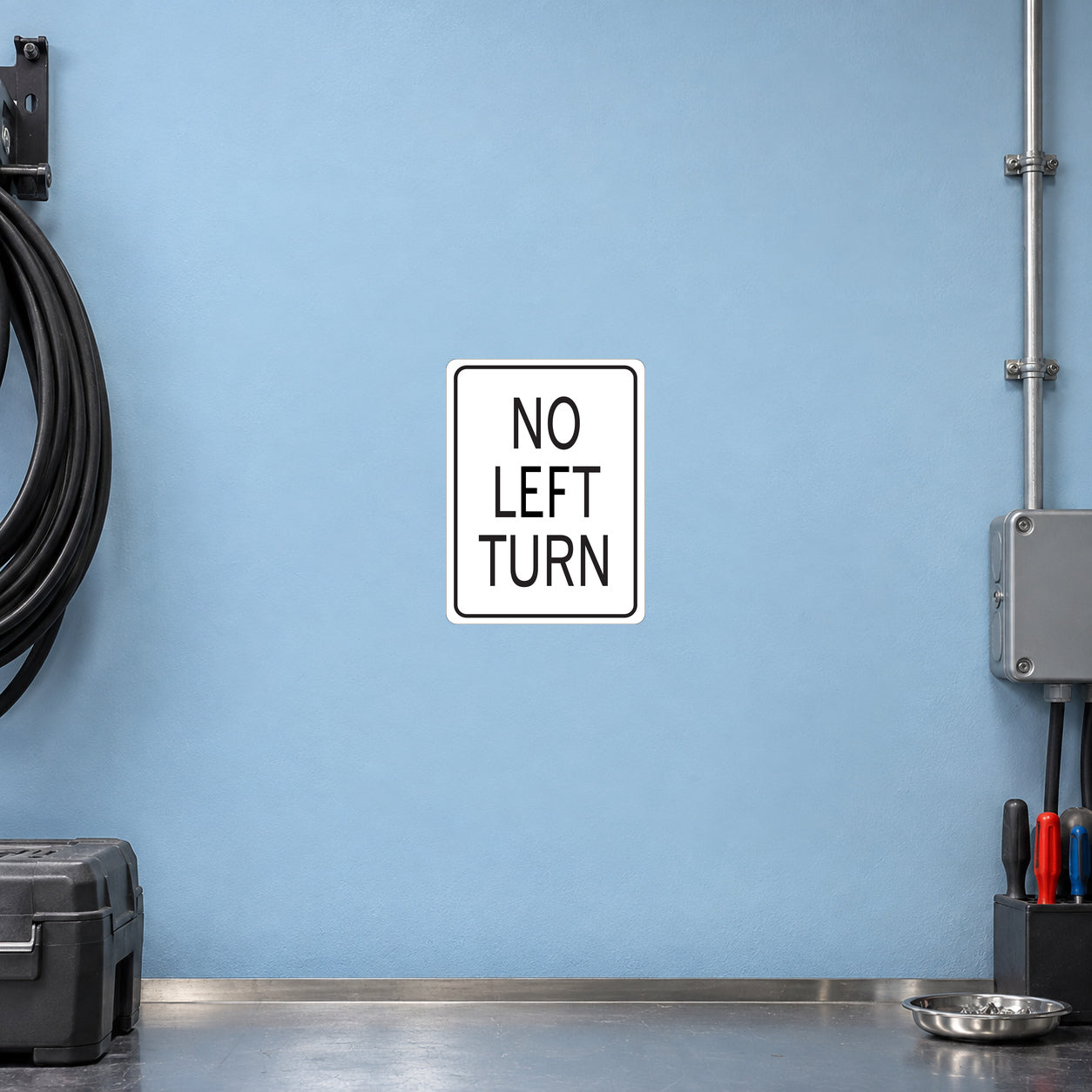 Road sign sticker with black text "NO LEFT TURN" on white square