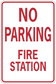 Red-bordered sticker with "NO PARKING FIRE STATION" text
