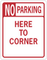 Red road sign sticker reading “NO PARKING HERE TO CORNER” with white border