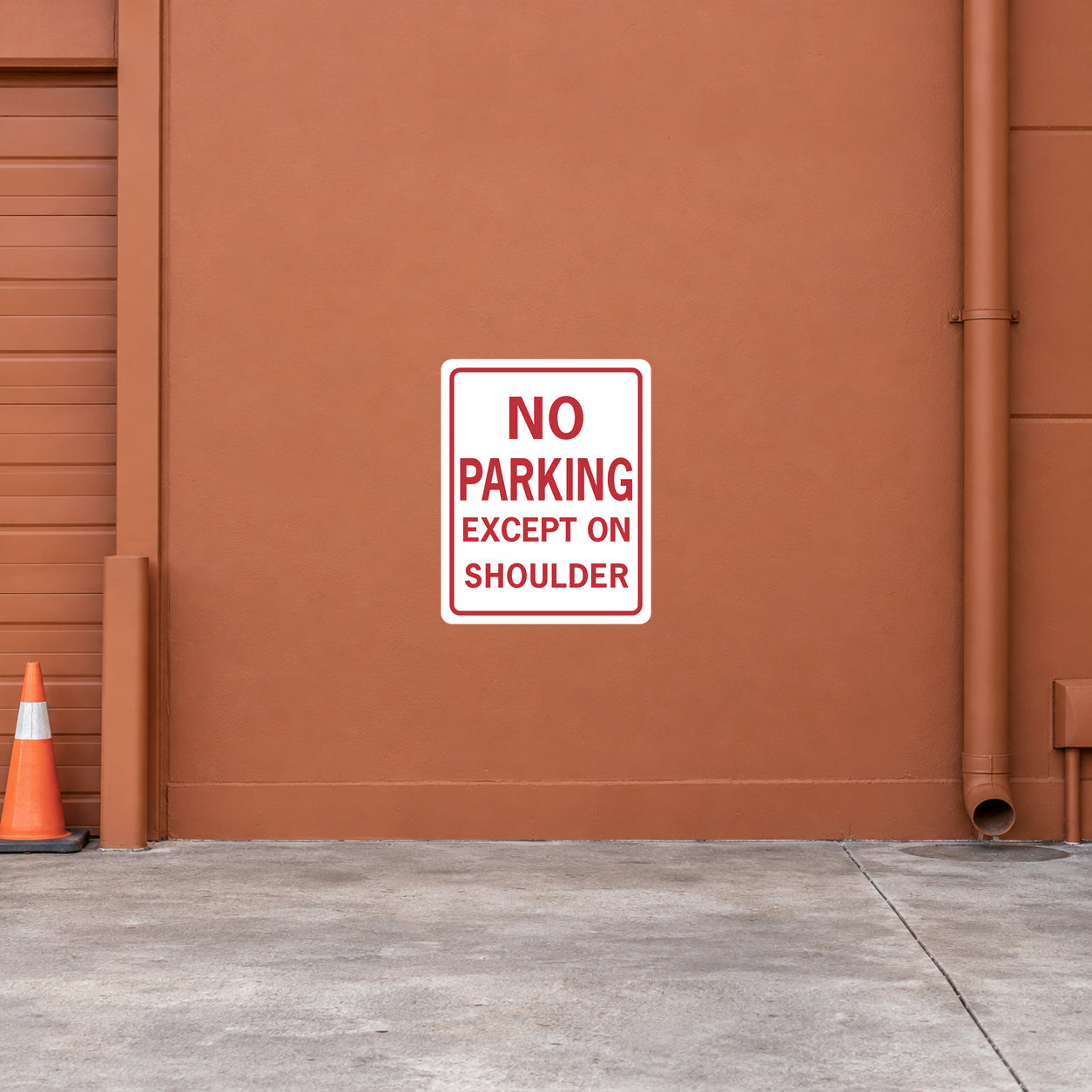 Road sign sticker: red "NO PARKING EXCEPT ON SHOULDER" on white square